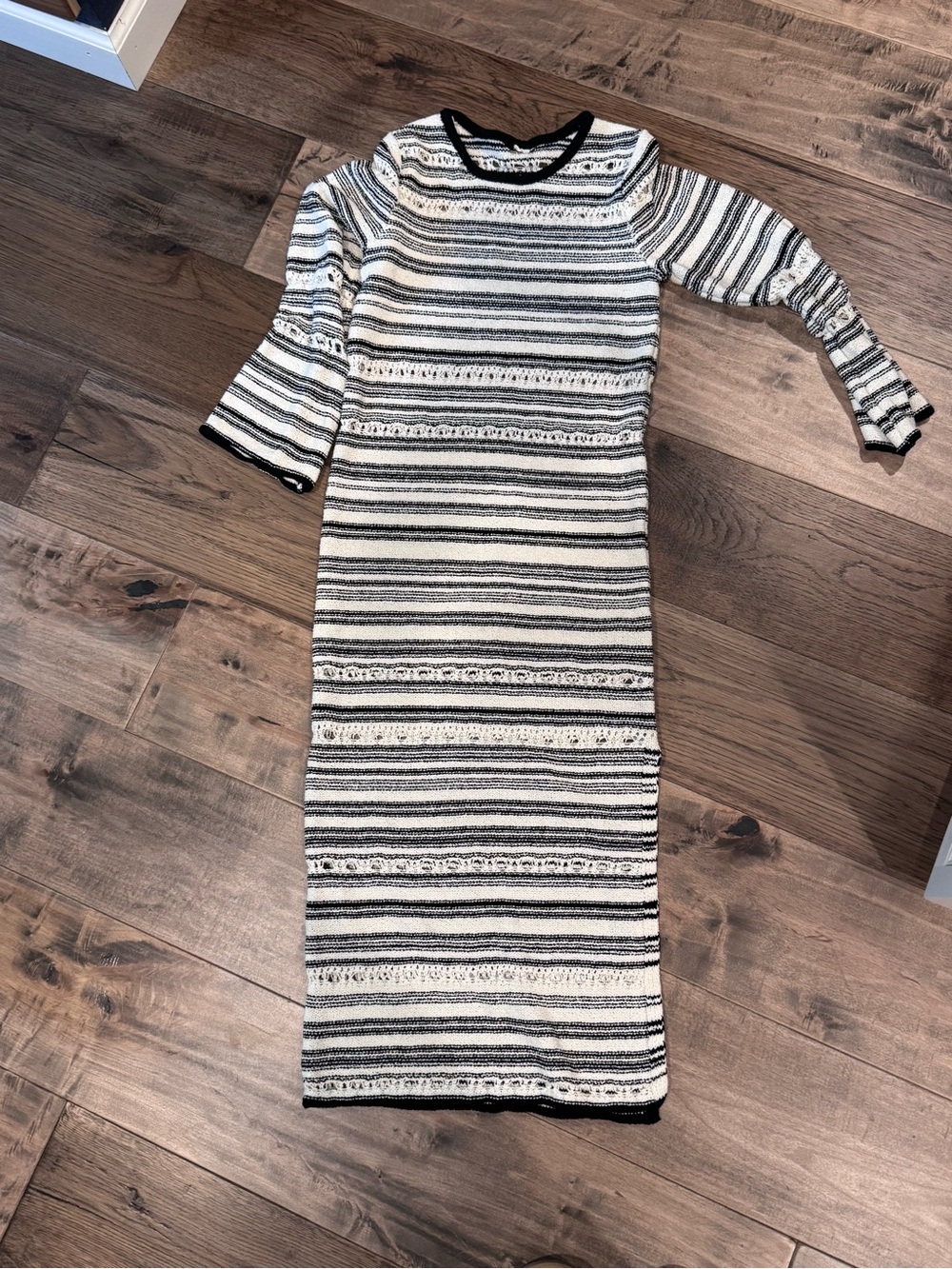 H&M Black and White Striped Long Sleeve Midi Dress.  Probably a small.